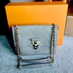 Louis Vuitton Vavin PM Empreinte Leather Monogram Shoulder Bag.